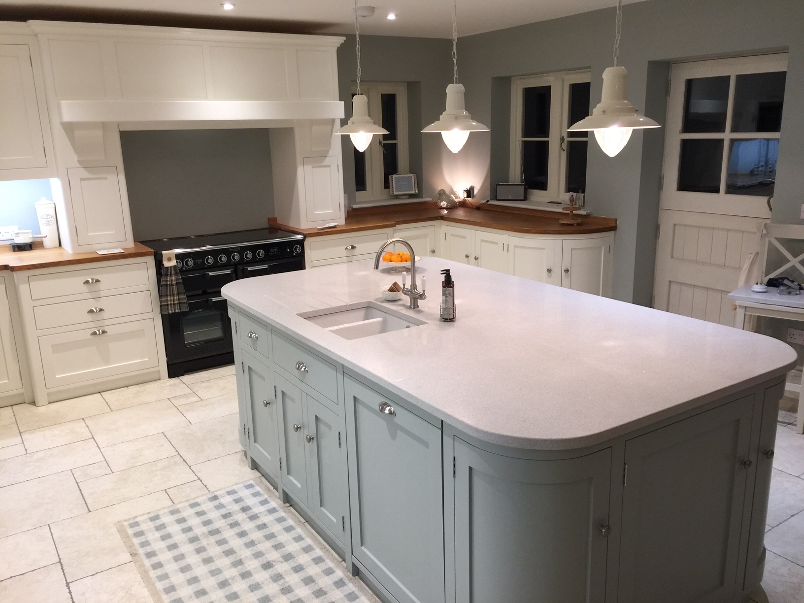 Fully bespoke shaker style kitchen hand built from solid wood finished in Farrow & ball pointing.